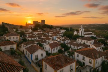 Vue du coucher de soleil sur le chateau à Óbidos, Portugal